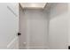 Interior of a closet showing a bar for hanging clothes and white walls at 3008 W Michigan Ave, Phoenix, AZ 85053