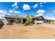 Charming single-story home with desert landscaping and a covered two-car carport at 3008 W Michigan Ave, Phoenix, AZ 85053