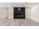 Contemporary fireplace features a sleek design and built-in television mount at 3008 W Michigan Ave, Phoenix, AZ 85053