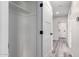 Clean hallway features bright white walls and doors, leading to a storage closet at 3008 W Michigan Ave, Phoenix, AZ 85053