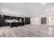 Open-concept living space seamlessly connects a modern kitchen with a spacious living area at 3008 W Michigan Ave, Phoenix, AZ 85053