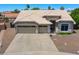 Charming home featuring a three-car garage, neutral tones, and well-maintained landscaping for great curb appeal at 870 N Criss St, Chandler, AZ 85226