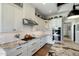Well-appointed kitchen boasting granite counters, tile backsplash, and ample cabinet space at 10160 E Whispering Wind Dr, Scottsdale, AZ 85255