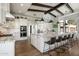 Bright open kitchen featuring a large island with seating and modern appliances at 10160 E Whispering Wind Dr, Scottsdale, AZ 85255