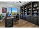 Spacious office with a built-in bookcase, a large window offering natural light and beautiful outdoor views at 10160 E Whispering Wind Dr, Scottsdale, AZ 85255