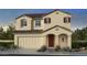 Charming two-story home with neutral paint, detailed shutters, and landscaped front yard at 10168 W Vale Dr, Avondale, AZ 85392