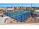 Community features several pickleball courts with blue and green surface within a fenced area at 10168 W Vale Dr, Avondale, AZ 85392