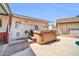 Backyard patio area features a hot tub at 10438 W Butler Dr, Peoria, AZ 85345