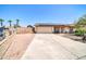 This beautiful home boasts a two-car garage and is equipped with solar panels at 10438 W Butler Dr, Peoria, AZ 85345