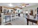 Bright kitchen features stainless steel appliances, a breakfast bar, and a dining area at 10438 W Butler Dr, Peoria, AZ 85345