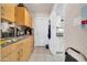 This functional pantry provides ample storage with built-in cabinets and shelving at 10438 W Butler Dr, Peoria, AZ 85345