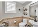 Cozy bathroom features decorative tile, attractive fixtures, and a modern sink at 11225 E Sylvan Ave, Mesa, AZ 85212