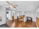 Upstairs loft featuring hardwood floors, natural light, and neutral paint at 11225 E Sylvan Ave, Mesa, AZ 85212