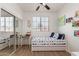bedroom offering a daybed, ceiling fan, natural light and modern finishes at 11979 W Pierce St, Avondale, AZ 85323