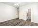 Bedroom with modern flooring, and a bathroom ensuite at 12911 W Campbell Ave, Litchfield Park, AZ 85340