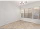 Unfurnished dining room featuring tile flooring and plenty of natural light from the windows at 12911 W Campbell Ave, Litchfield Park, AZ 85340