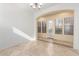 Bright dining room with neutral colors and ceramic tile flooring at 12911 W Campbell Ave, Litchfield Park, AZ 85340