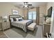 Comfortable bedroom with a cozy bed, soft lighting, and elegant furnishings, perfect for restful nights at 1421 W Rylie Ct, Queen Creek, AZ 85144