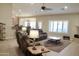 Open-concept living area with stylish furniture and plenty of natural light at 1421 W Rylie Ct, Queen Creek, AZ 85144