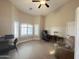Spacious office featuring a ceiling fan, shutters, and flexible seating arrangements at 1421 W Rylie Ct, Queen Creek, AZ 85144