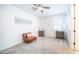 Cozy bedroom with neutral tones, ceiling fan and natural light at 14637 W Wethersfield Rd, Surprise, AZ 85379