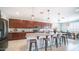 Modern kitchen featuring a large island, stainless steel appliances, and ample cabinet space at 14637 W Wethersfield Rd, Surprise, AZ 85379
