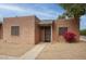 Charming single-story home featuring a stucco exterior, gravel landscaping, and a covered front entrance at 15601 N 27Th St # 37, Phoenix, AZ 85032