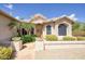 Inviting front entrance with stone walkway and desert landscaping at 16112 W Whitton Ave, Goodyear, AZ 85395