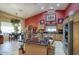 The spacious kitchen has stainless appliances, light wood cabinets and a large center island at 16112 W Whitton Ave, Goodyear, AZ 85395