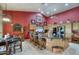Bright kitchen with a large island, granite countertops, and stainless steel appliances at 16112 W Whitton Ave, Goodyear, AZ 85395
