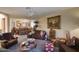 Spacious living room featuring comfortable furnishings and plenty of natural light at 16112 W Whitton Ave, Goodyear, AZ 85395