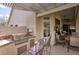 Outdoor kitchen with built-in grill, countertop space, and seating, perfect for al fresco dining and entertaining at 16112 W Whitton Ave, Goodyear, AZ 85395
