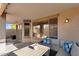 Covered patio with comfortable seating, ideal for outdoor relaxation and entertaining at 17152 W Watkins St, Goodyear, AZ 85338