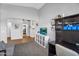 Cozy den features modern decor and a versatile layout perfect for a home office or entertainment space at 17152 W Watkins St, Goodyear, AZ 85338