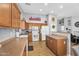 Spacious kitchen offering great storage and functionality with views into the Gathering room at 17152 W Watkins St, Goodyear, AZ 85338