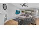 Comfortable living room with wood flooring, large sofa, and entertainment center at 17152 W Watkins St, Goodyear, AZ 85338