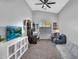 Bright home office features a large window, neutral walls, and ample space for productivity and comfort at 17152 W Watkins St, Goodyear, AZ 85338