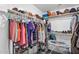 Large walk-in closet with clothing racks, shelving, and organized storage at 17152 W Watkins St, Goodyear, AZ 85338