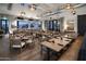 Spacious dining area with ample seating and picturesque views through expansive windows at 17160 W Montpelier St, Surprise, AZ 85388