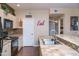 Well-equipped kitchen showcases tile countertops and backsplash, complementing the black appliances at 18416 N Cave Creek Rd # 3050, Phoenix, AZ 85032