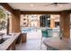 The community offers an outdoor kitchen and poolside dining area at 18416 N Cave Creek Rd # 3050, Phoenix, AZ 85032