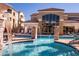 Resort-style pool area with fountains and comfortable seating offers a relaxing outdoor experience at 18416 N Cave Creek Rd # 3050, Phoenix, AZ 85032