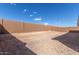 Backyard with privacy wall and low maintenance landscaping at 18498 E Dario Rd, Gold Canyon, AZ 85118