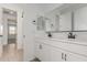 Bathroom featuring double vanity with white countertops, black hardware, and tile floors at 18498 E Dario Rd, Gold Canyon, AZ 85118