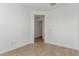Neutral bedroom with tile floors and a view into the hallway at 18498 E Dario Rd, Gold Canyon, AZ 85118