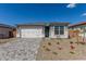 Charming single-story home features a brick driveway and neutral stone accents at 18498 E Dario Rd, Gold Canyon, AZ 85118