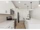 Well-equipped kitchen showcases stainless appliances, an island, and stylish hardware at 18498 E Dario Rd, Gold Canyon, AZ 85118