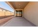 The covered patio includes sliding glass doors and plenty of shade at 18498 E Dario Rd, Gold Canyon, AZ 85118