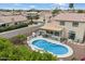 Aerial view of the home highlighting the pool, outdoor kitchen, and patio area at 19203 N 39Th Way, Phoenix, AZ 85050