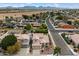 An aerial view showcases this community's beautiful homes, mountain views, and desert landscapes at 19203 N 39Th Way, Phoenix, AZ 85050